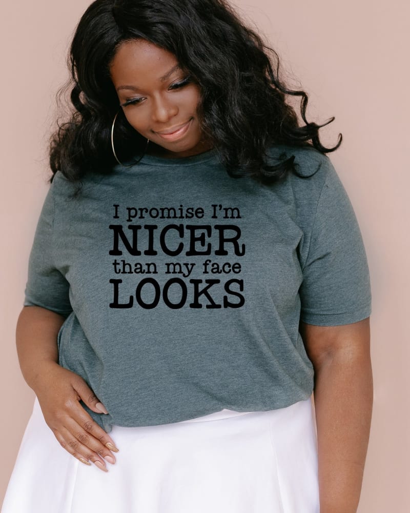 Front of a model wearing a size XL I'm Nicer Than My Face Looks in Forest by Simply Sage Market. | dia_product_style_image_id:281385